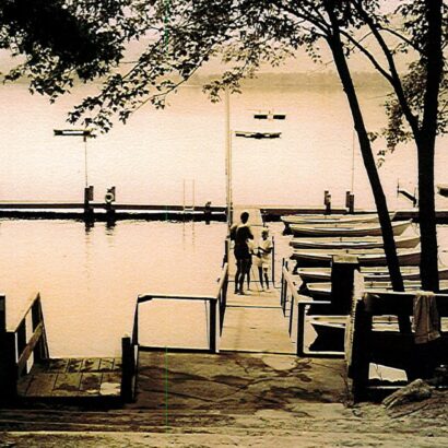 A t-shaped dock and extension accommodated swimmers and sailboats during the Camp Winnemont era. The property's current owner is seeking approval to accommodate 47 powerboats and jet skis.